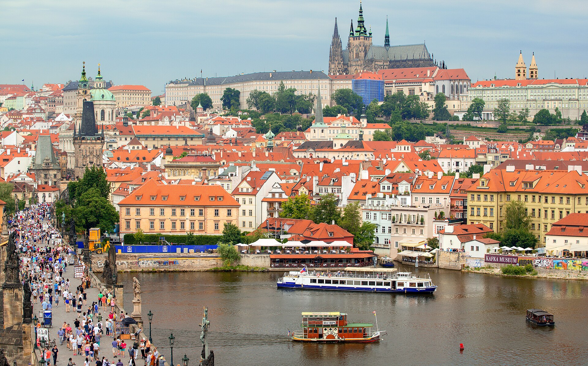 Boat on the Vltava River near Charles Bridge